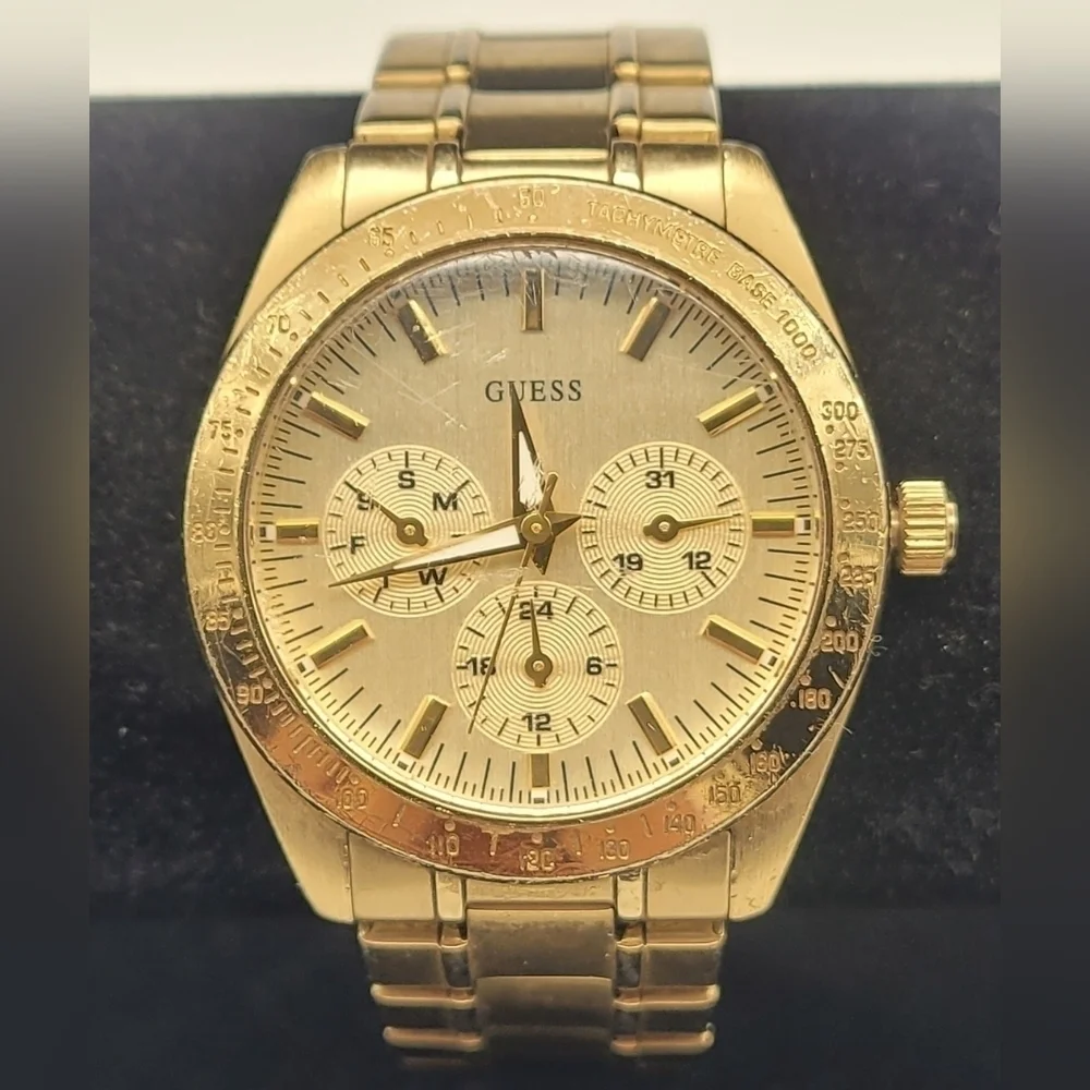 Guess Gold Tone Stainless Steel GMT Tachymeter Ladies Watch U12004L2​​​